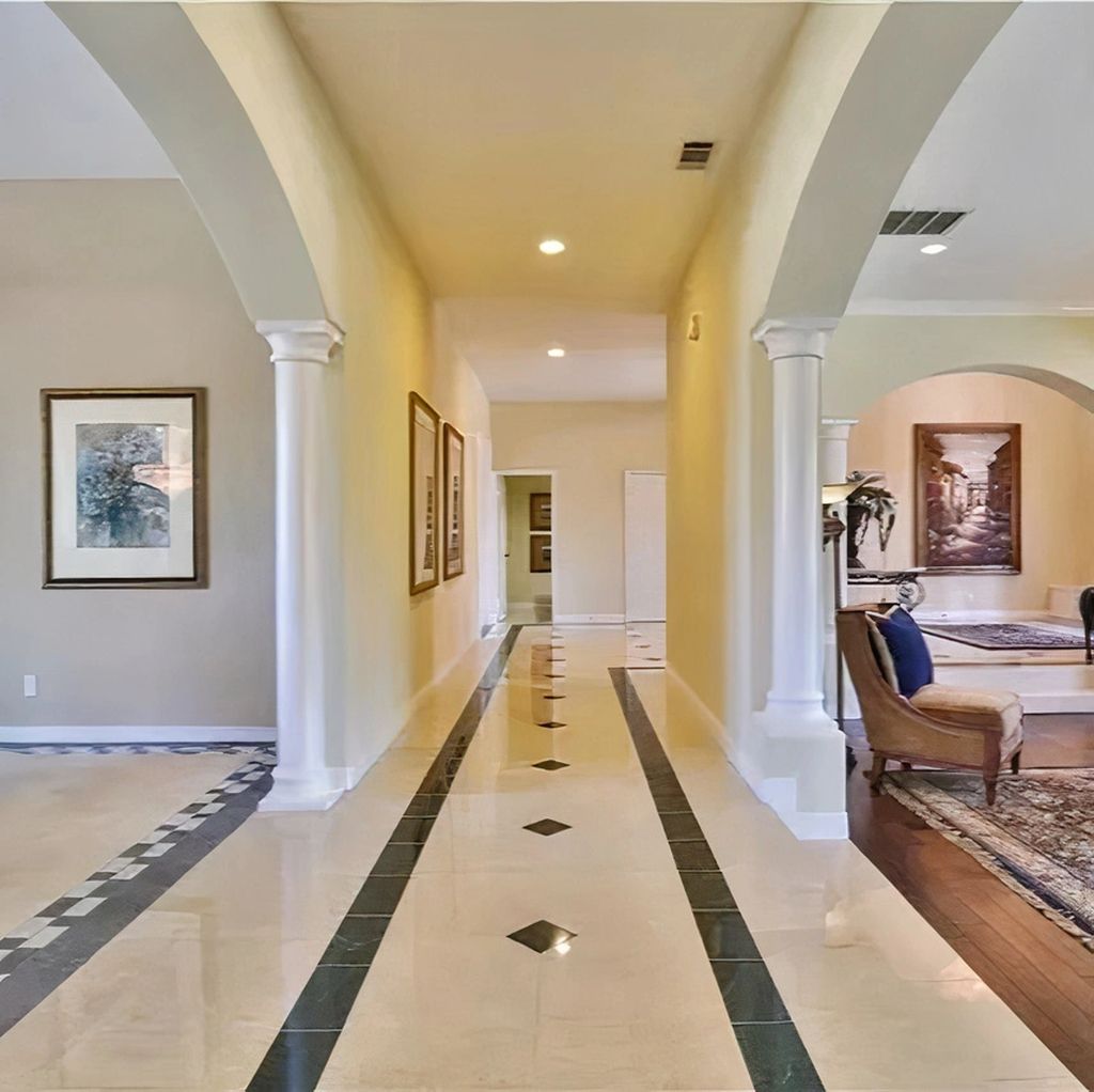 The backyard swimming pool and spa area, a centerpiece of the outdoor living space.