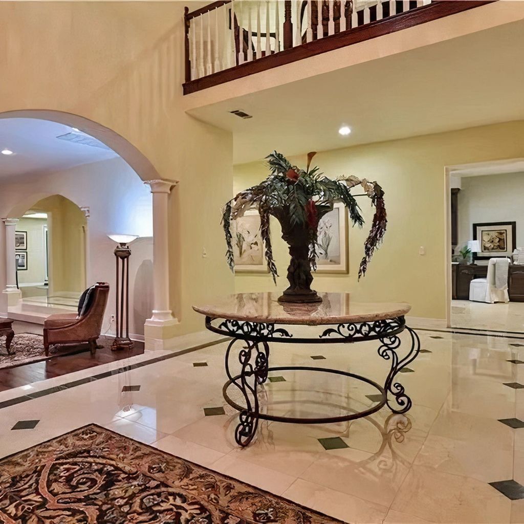 The home’s classic 1977 California suburban architecture, featuring a stucco exterior and traditional two-story form.