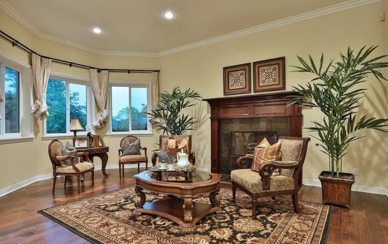 The swimming pool and hot tub viewed from the patio, illustrating the seamless indoor-outdoor connection.