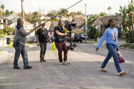 Craftsman-style residential homes along a tree-lined street in the Crenshaw neighborhood of South Los Angeles