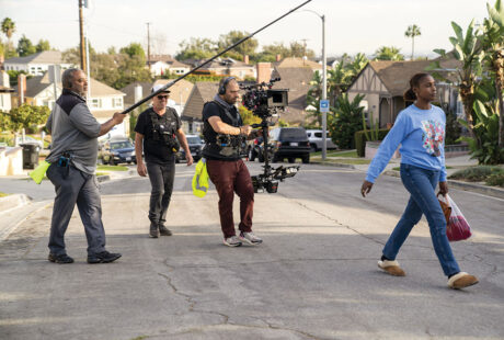 Craftsman-style residential homes along a tree-lined street in the Crenshaw neighborhood of South Los Angeles
