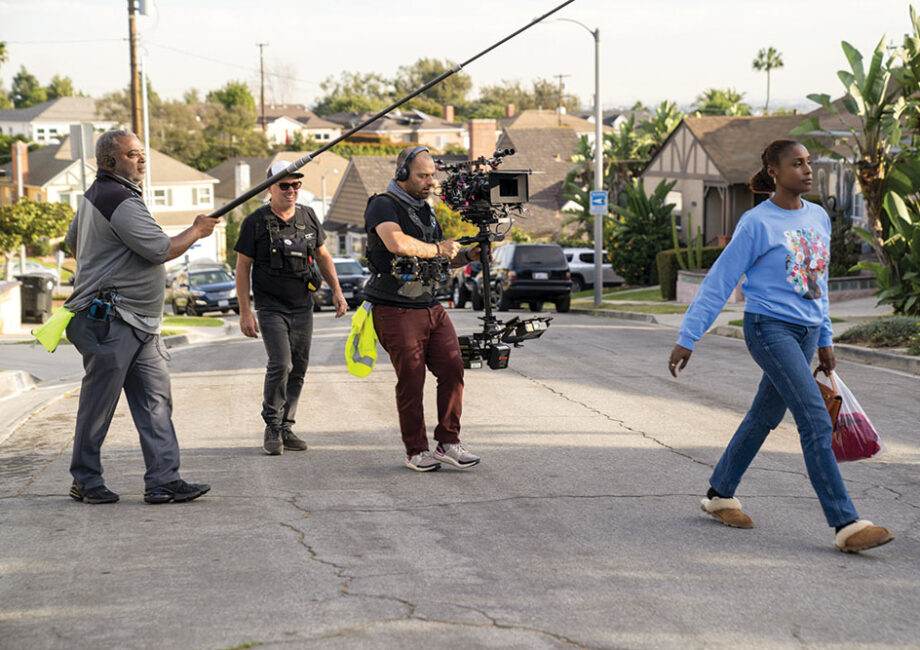 Craftsman-style residential homes along a tree-lined street in the Crenshaw neighborhood of South Los Angeles