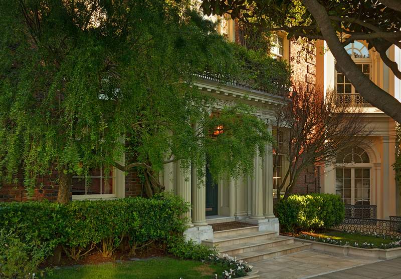 Elegant mansion entrance with columns and greenery in Pacific Heights San Francisco