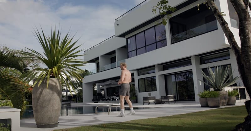Logan Paul's $32.5 million Puerto Rico mansion features a modern design with an infinity pool and tropical landscaping. 