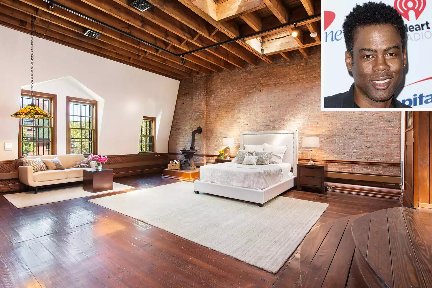 Interior of Chris Rock's former Clinton Hill carriage house showing exposed brick and timber ceiling, with an inset portrait of Rock